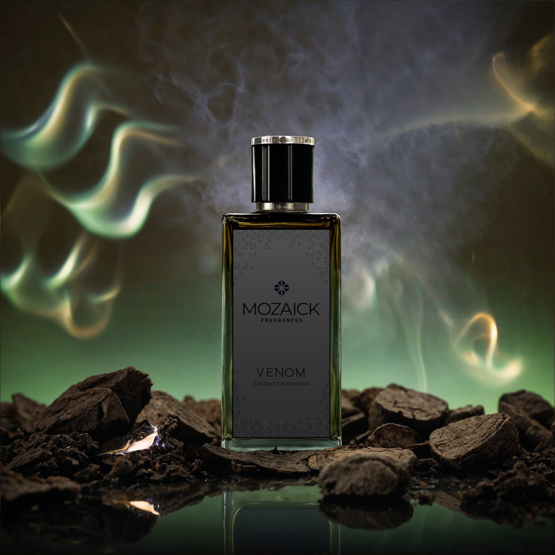 VENOM Extrait de Parfum 50 ml by MOZAICK – bottle among dark pieces of wood with smoke on a green background